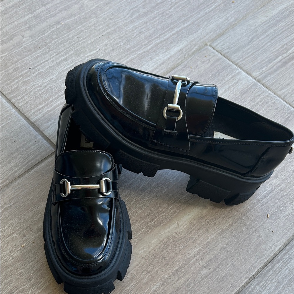 Steve Madden Glossy Black Loafers with Silver Accent